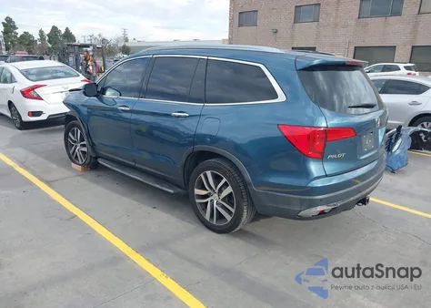2017 Honda Pilot Touring z USA, uszkodzony, nr VIN 5FNYF5H93HB001903